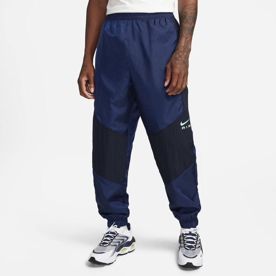 Штани Nike Sportswear Air Woven Pants Blue чоловічі сині FN7688-410